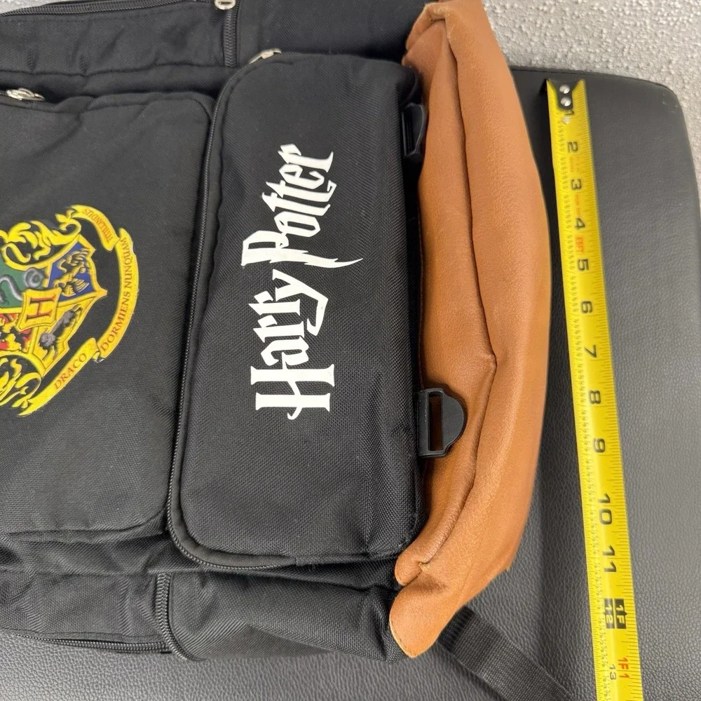HARRY POTTER black Back Pack With Brown Leather Accents And House Crest Logo